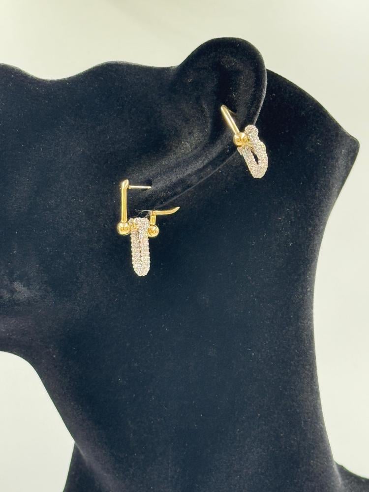 حلق تصميم عالمي ذهب عيار 18