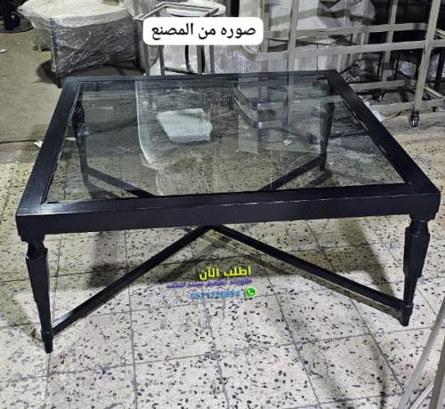 طاوله قوه لون اسود جزاز مع خشب