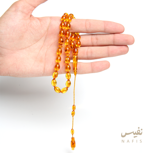سبحه كهرمان عسلي شفاف محشرة