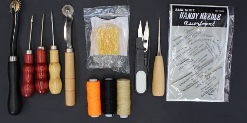 مجموعة ادوات الجلد C303