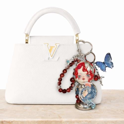 سكولباندا  - تعليقة شنطة