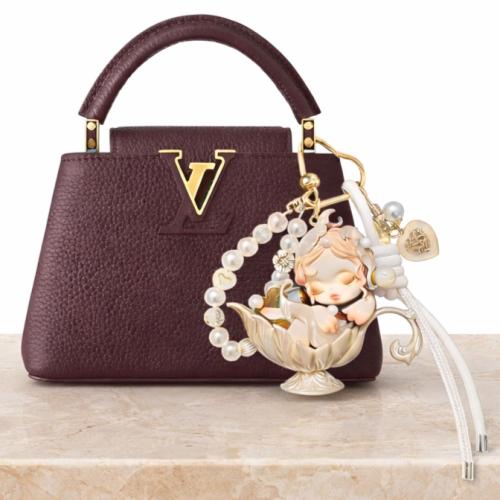 سكولباندا  - تعليقة شنطة