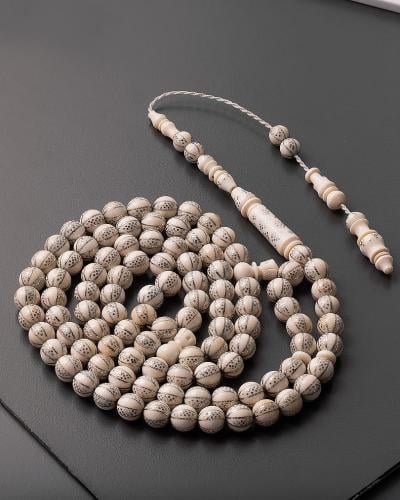Ivory (elephant tusk) rosary engraved with silver 99 beads