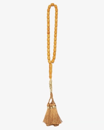 Brown rosary scented with amber dust
