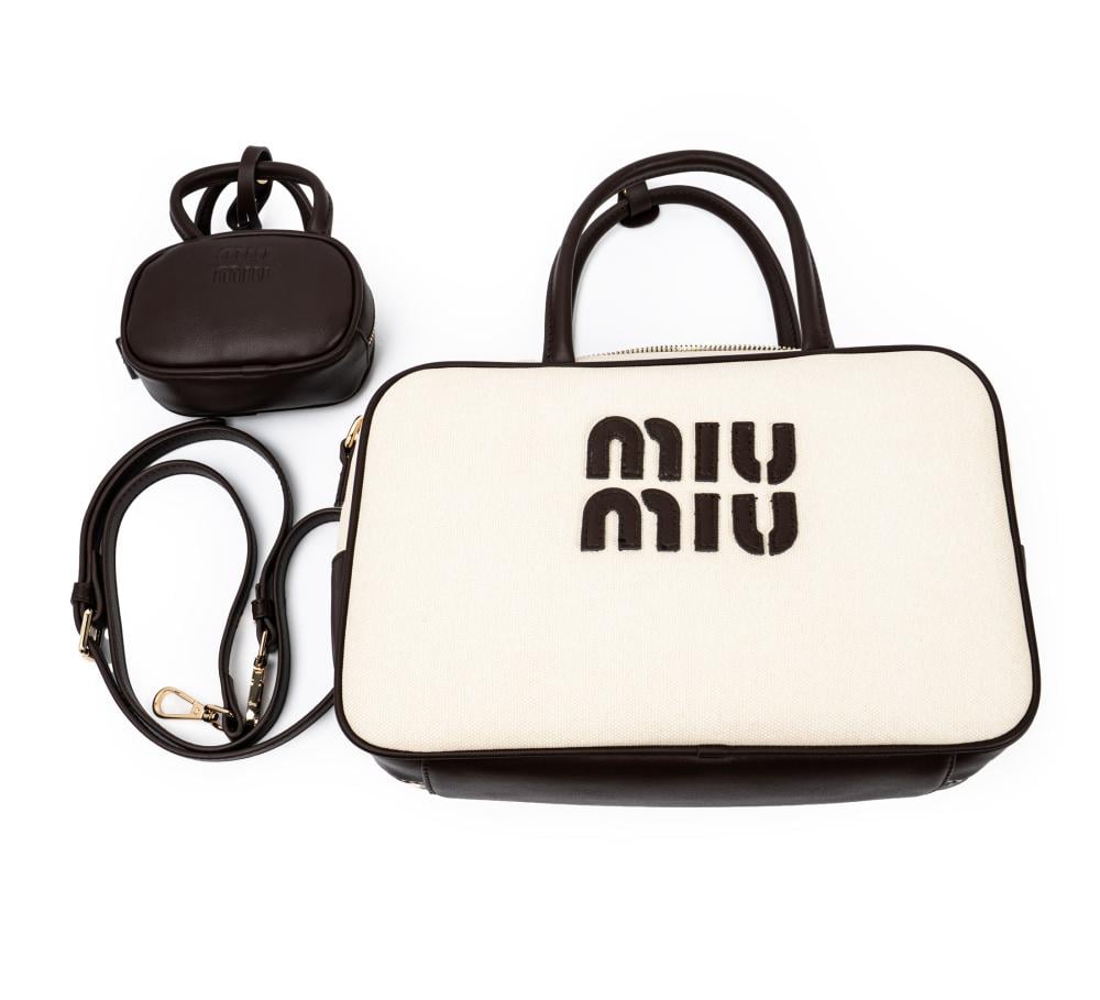 حقيبة MIU MIU  تصميم قماش بإطار جلدي