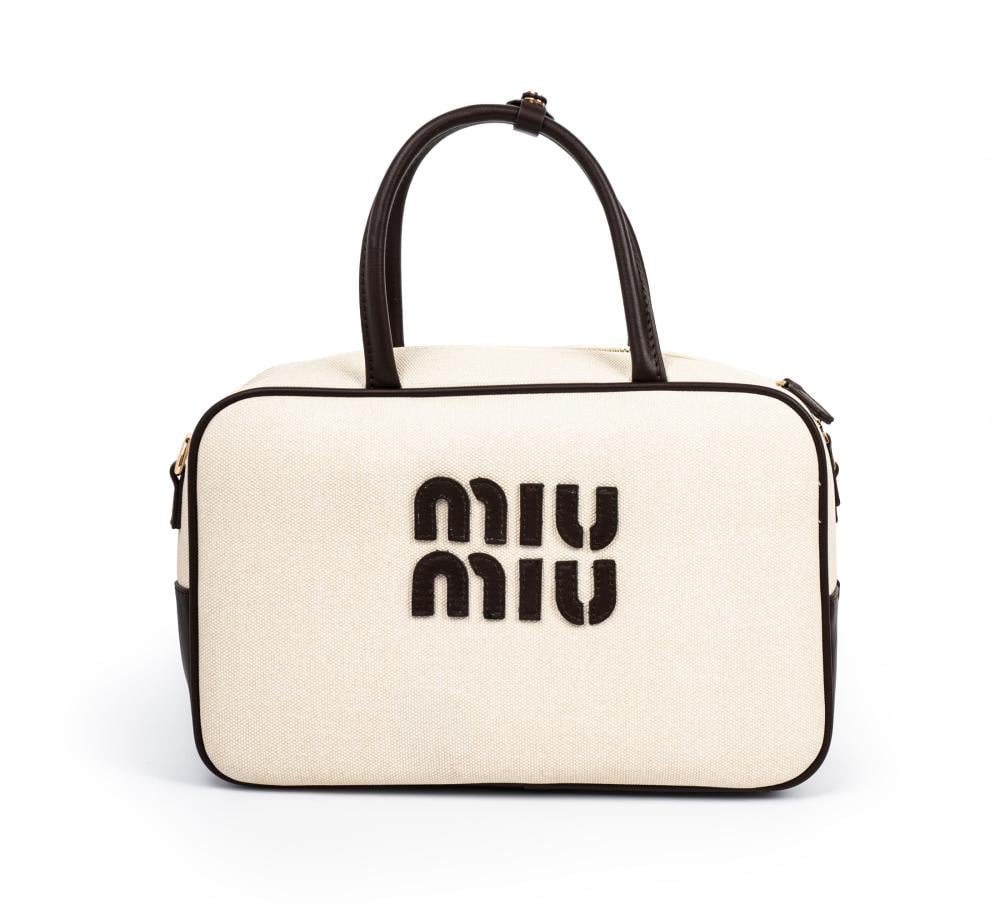 حقيبة MIU MIU  تصميم قماش بإطار جلدي