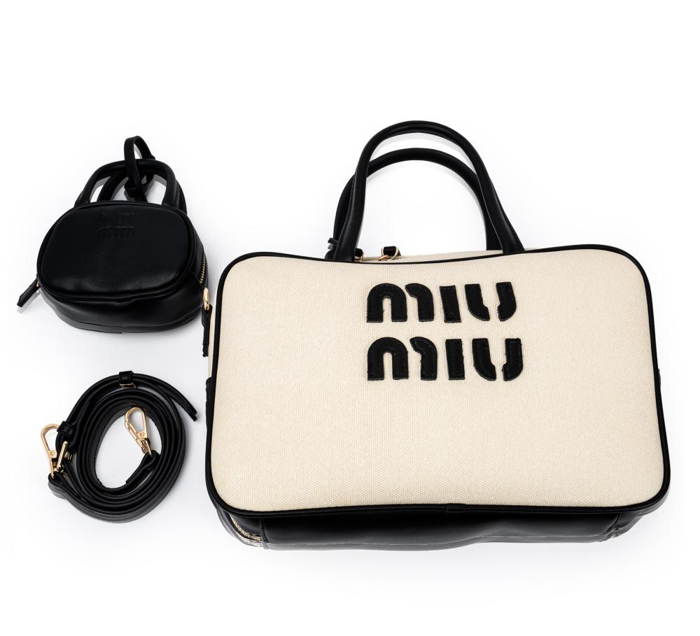 حقيبة MIU MIU  تصميم قماش بإطار جلدي