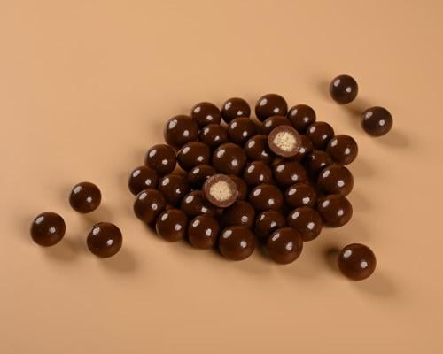 دراجيه الكرسبي بشوكولاتة الحليب