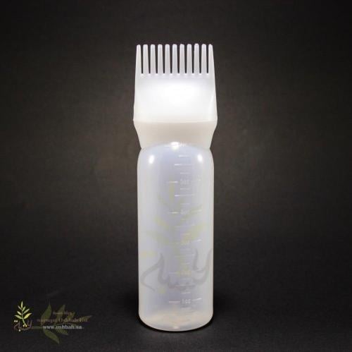 فرشاة توزيع زيت للشعر