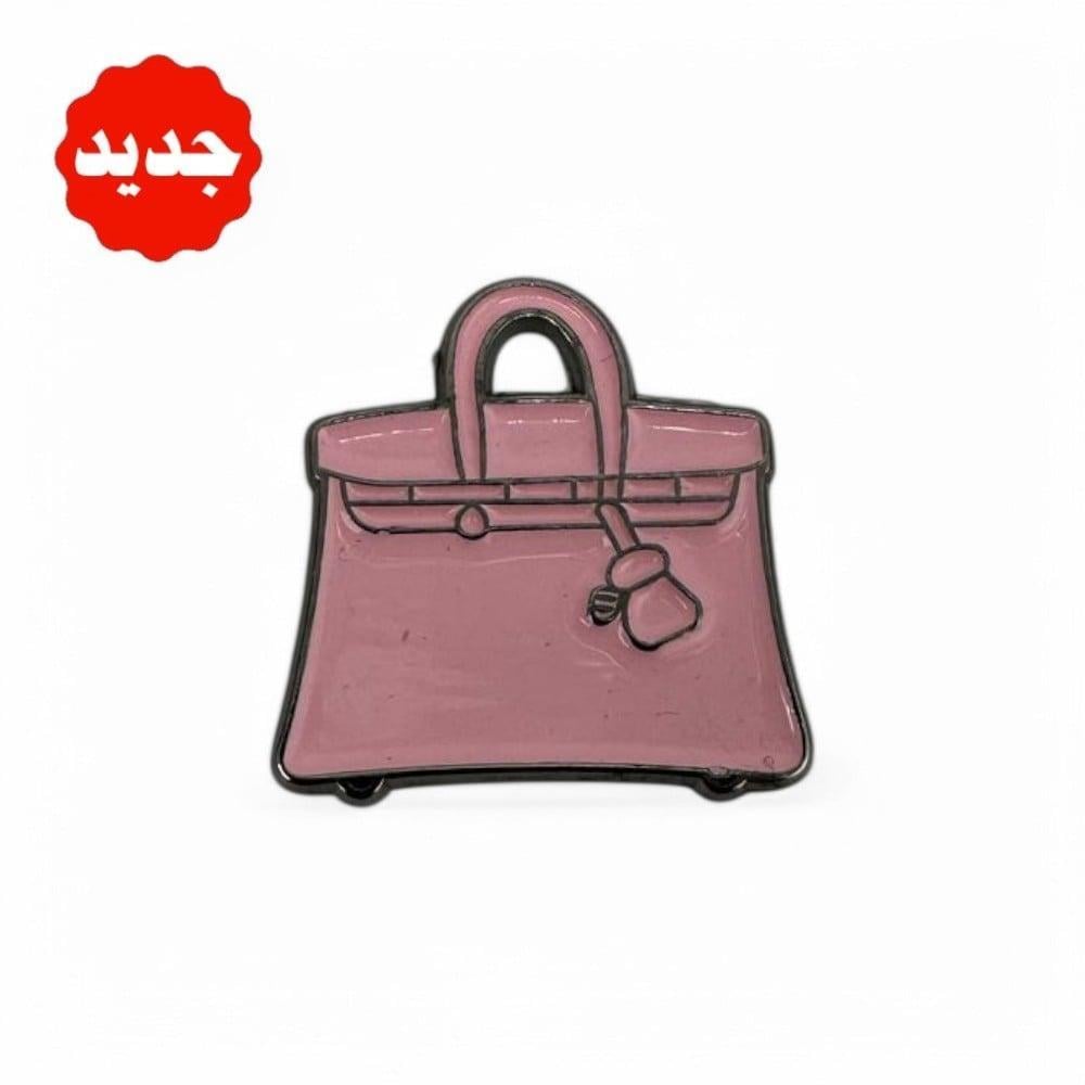 ستيكر معدني للجوال – شنطة نسائية باللون الوردي