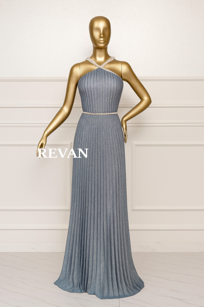 فستان سهرة مطرز بقصة هالتر فاخرة من ريڤــان