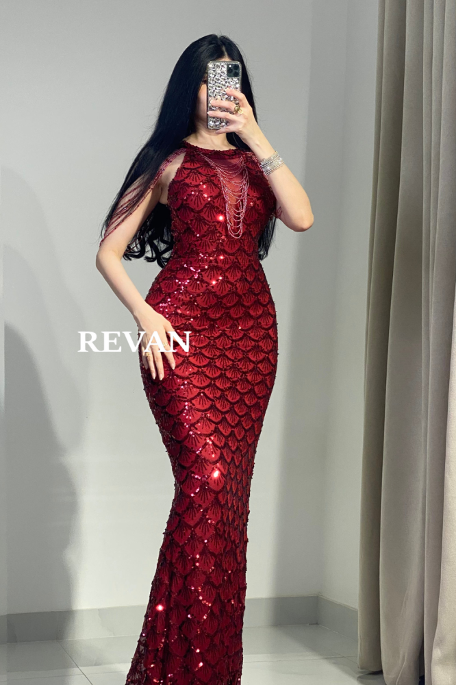 فستان سهرة فاخر من ريفان مع تطريز فخم وتصميم أنيق