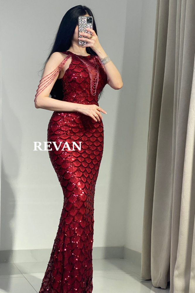 فستان سهرة فاخر من ريفان مع تطريز فخم وتصميم أنيق