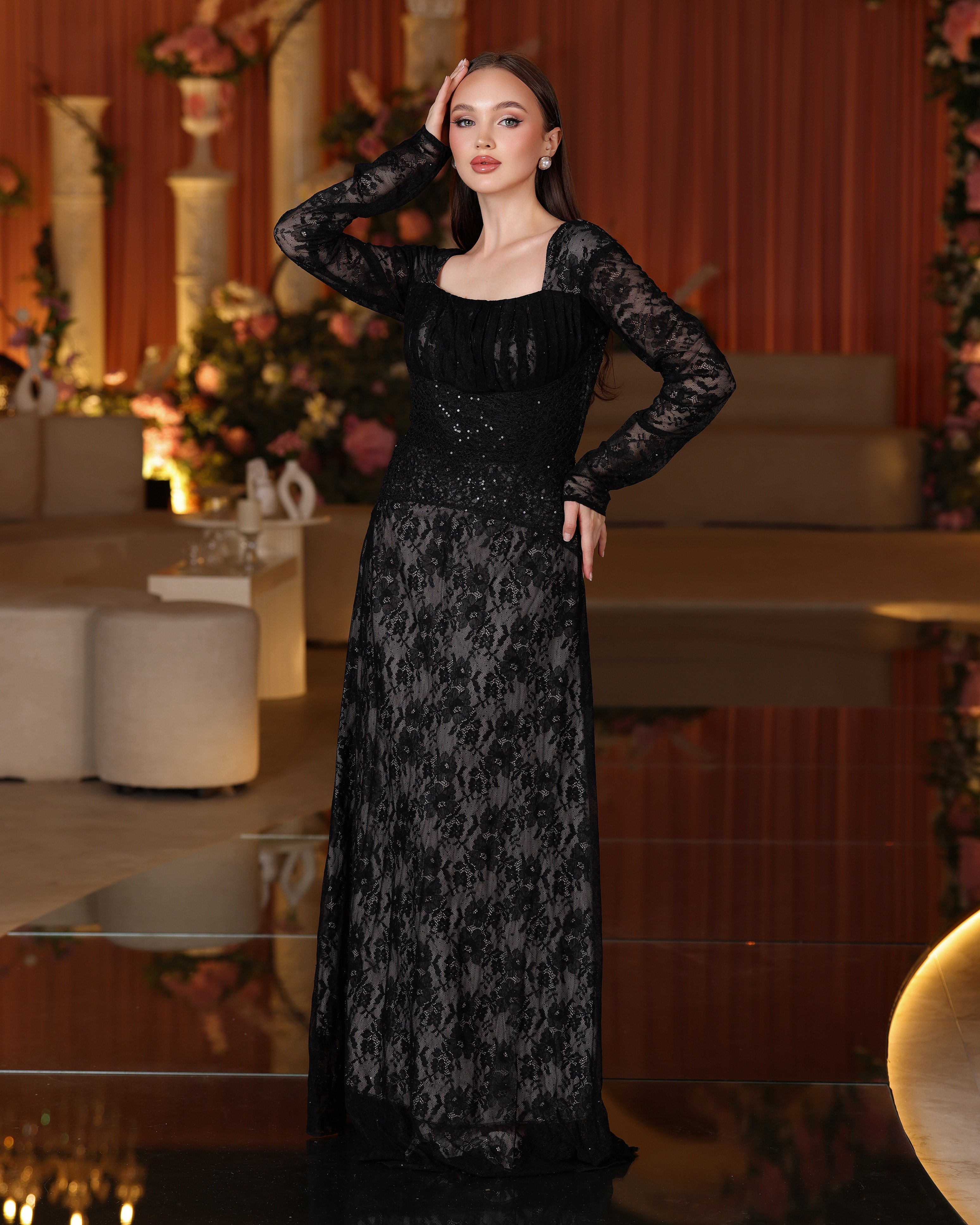A long evening dress with an elegant belt, classic luxury from Rivan -