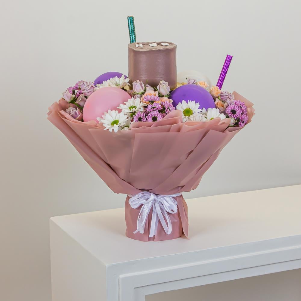 تنسيق لحظات العيد والزهور مع الكيك والزهور الطبيعية لأعياد الميلاد