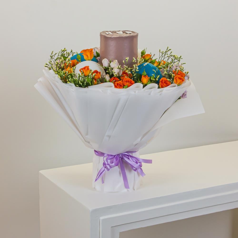 تنسيق وهج الميلاد والزهور مع الزهور الطبيعية والكيك