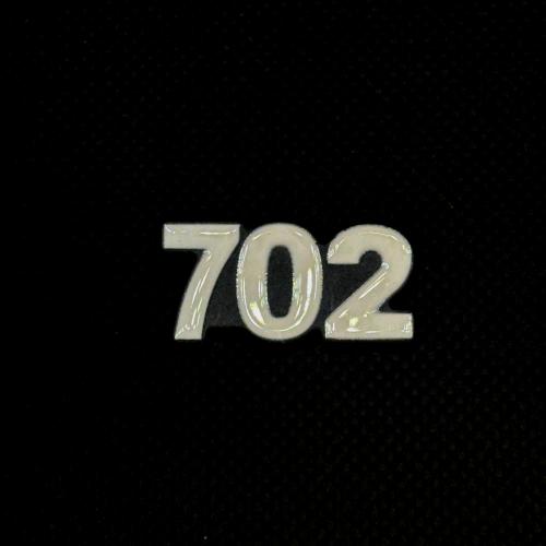 ملصق - 702