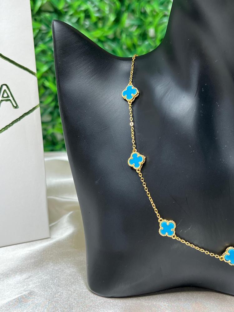 سلسال Van cleef المميز ذهبي - سماوي