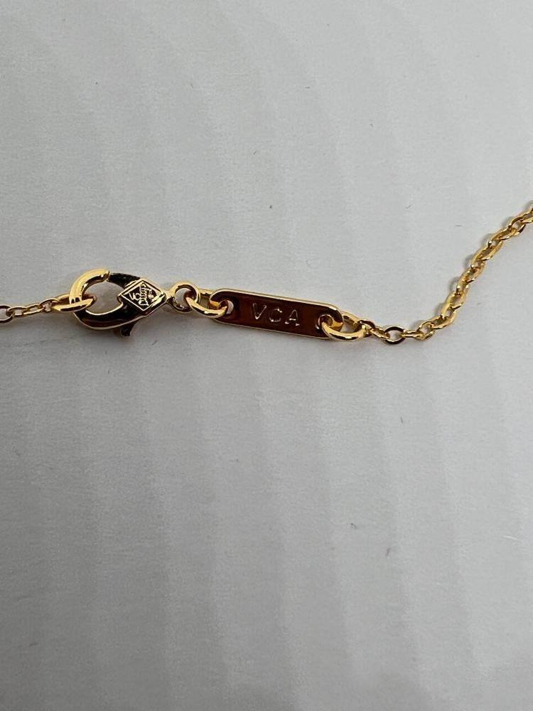 سلسال Van cleef المميز ذهبي - سماوي