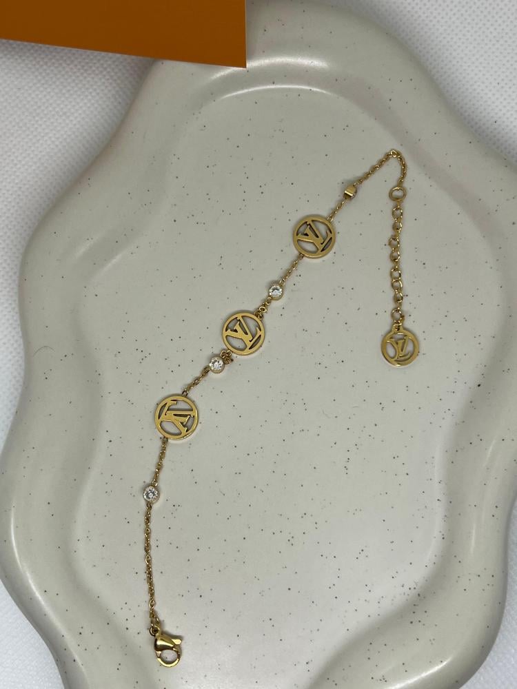 إسوارة LOUIS VUITTON معدن ذهبي