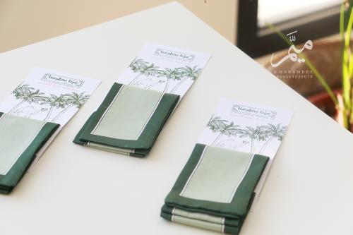 توزيعات سكارف اليوم الوطني اخضر