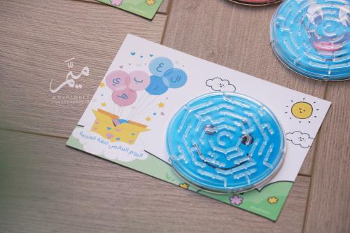 ميدالية توزيعات يوم اللغه العربية