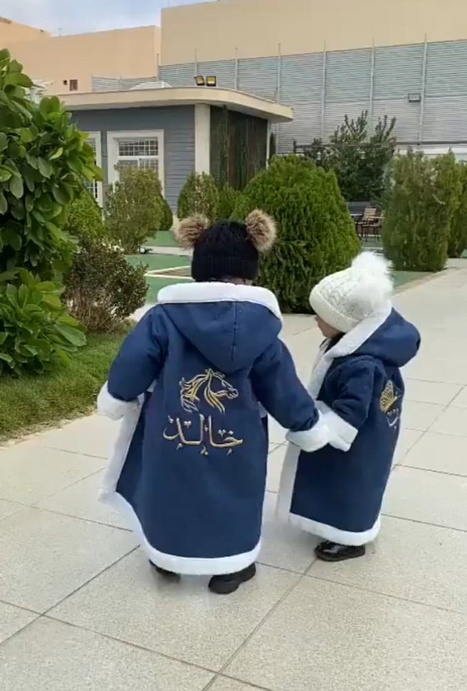 فروة شتوي بناتي ولادي نسائي  باللون الكحلي مع كتابة الاسم