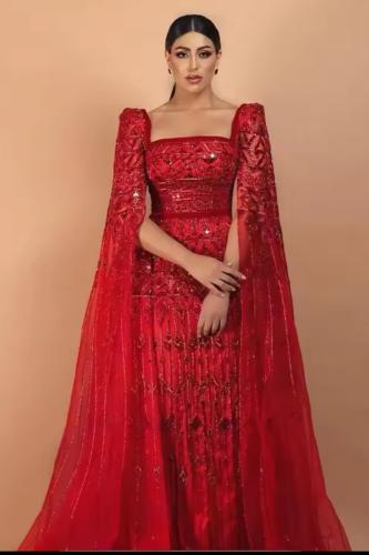 فستان سهرة يتوفر باللون الاحمر والعشبي توفر حسب المقاس