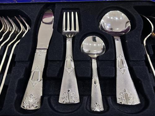 A set of golden spoons, 24 pieces, for 6 people