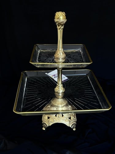 ستاند دورين زجاج ذهبي