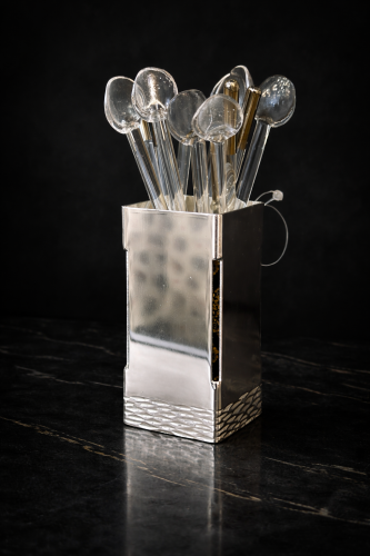 Silver stand with 12 glass spoons