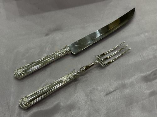 طقم شوكه وسكين تقطيع اللحم