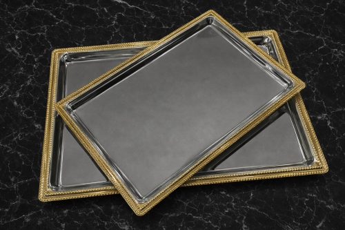 Two-piece tray set, silver and gold