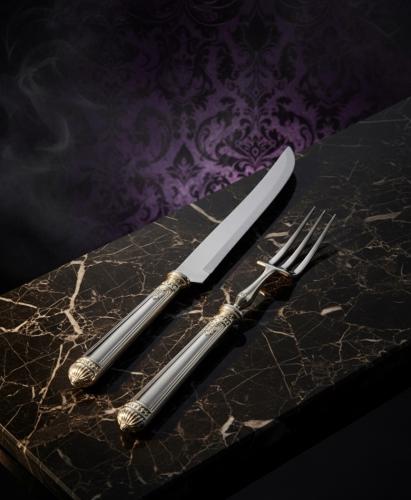 طقم شوكه وسكين تقطيع اللحم