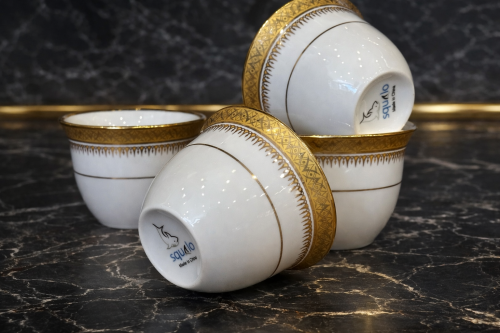 12 gold porcelain cups, medium size