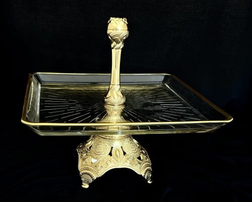 ستاند دور زجاج ذهبي