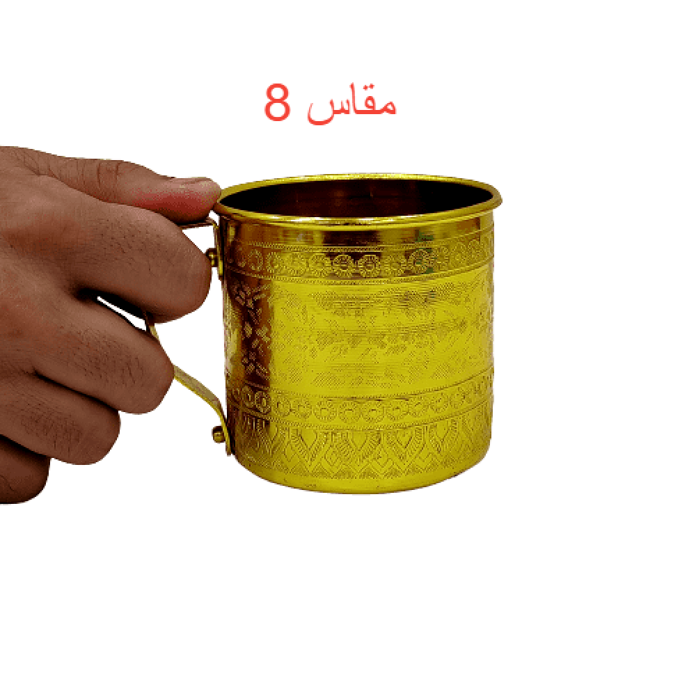 كوب منقوش بيد ذهبي