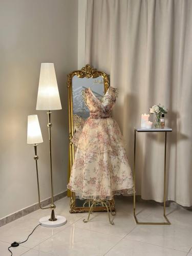 5645 -فستان ميدي بنقشة زهرية أنيقة