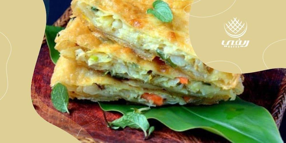 طريقة عمل المطبق بالبيض والكراث