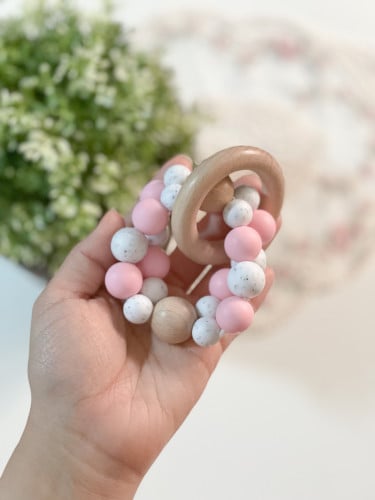 Pink ratchet and teether