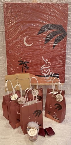 توزيعات شهر رمضان مع لوحة شهر رمضان