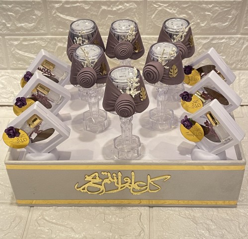 توزيعات العيد مع كتابة الاسم على اللوقو