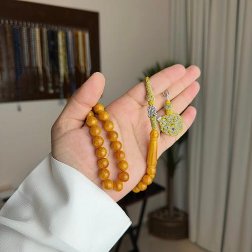 سبحة كركمي مطلي فضه