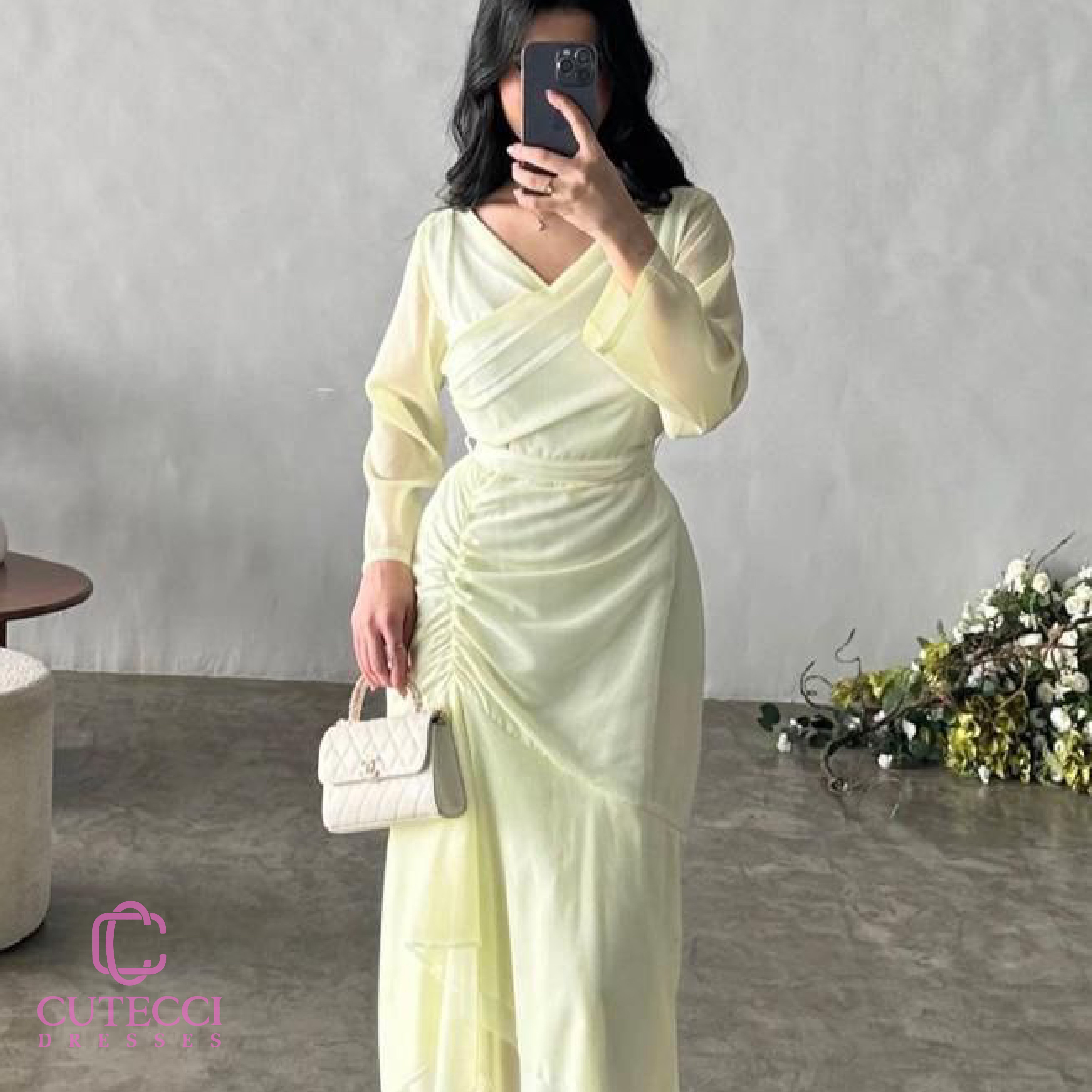 فستان ليموني ناعم بأكمام طويلة وقصة جذابة من Cutecci