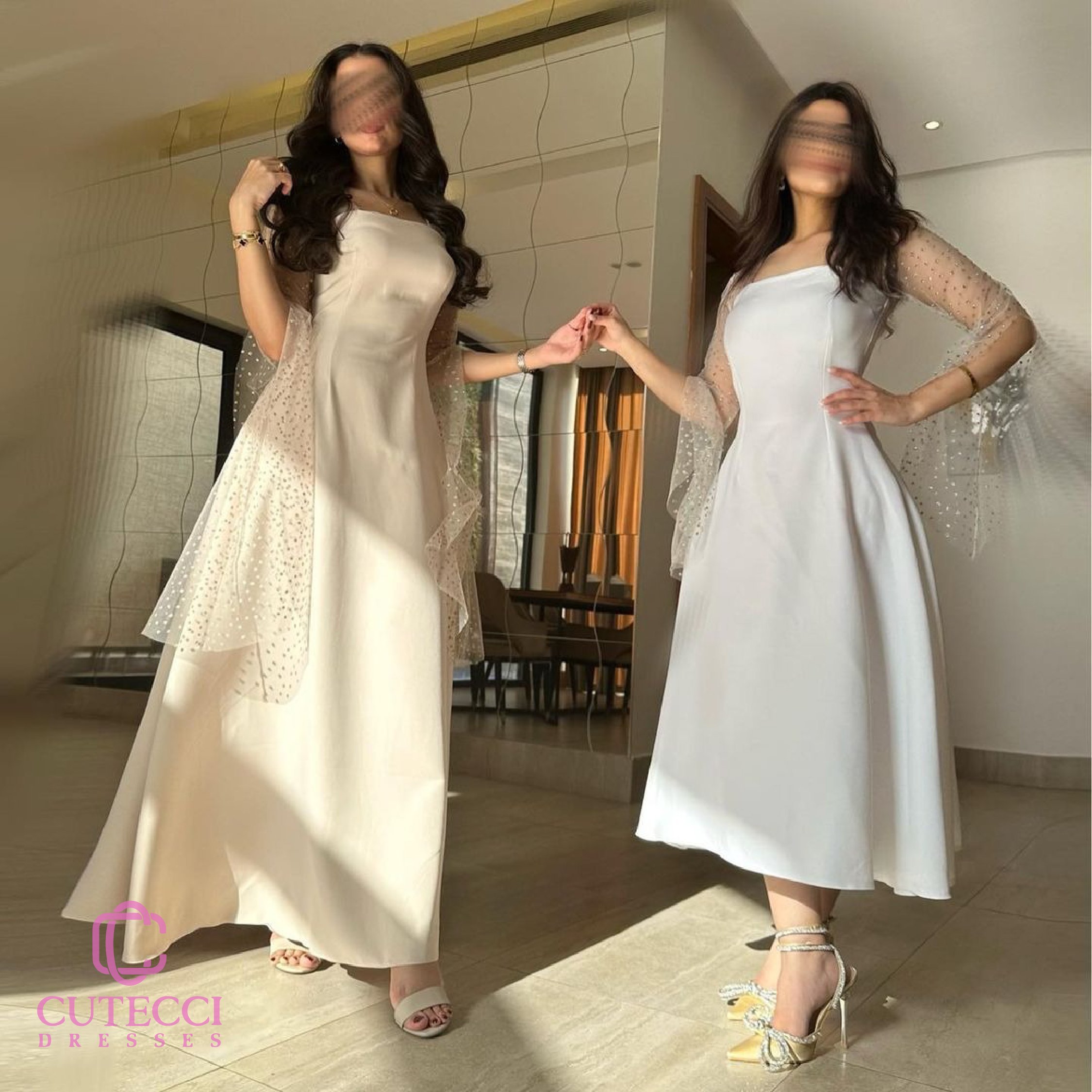 فستان سهرة كم منقط ذهبي بألوان ناعمة وتصميم أنثوي ناعم