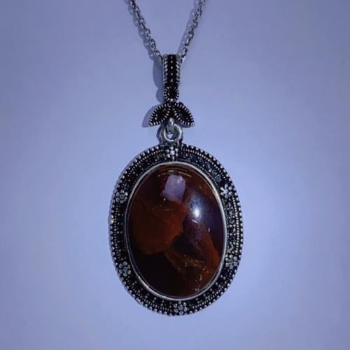 تعليقة فضة سلك باشكال مميزه بحجر العقيق اليماني مزعفر