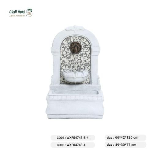 نافورة اندلسية بيضاء ذات نقوش بيج مع بني