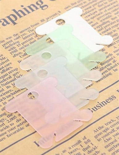 كرت بكرة خيط / ادوات تنظيم خيوط ( 24 حبه شفاف ملون )