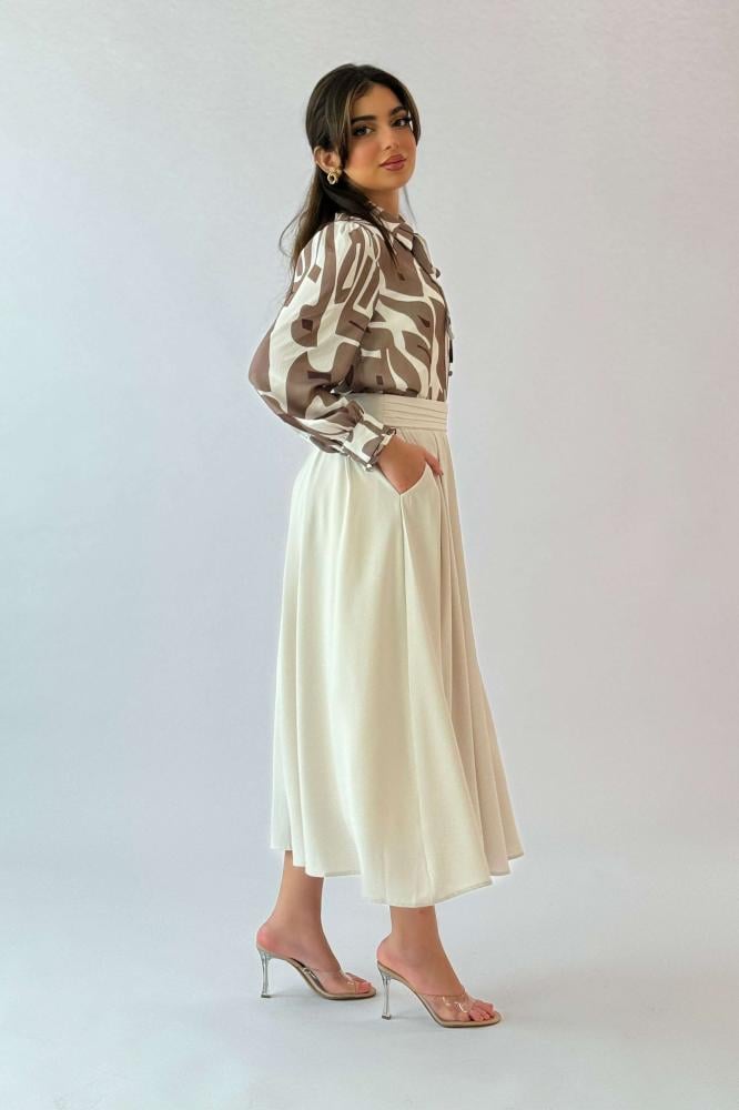 Beige midi flare skirt المقاس:(S - 36)