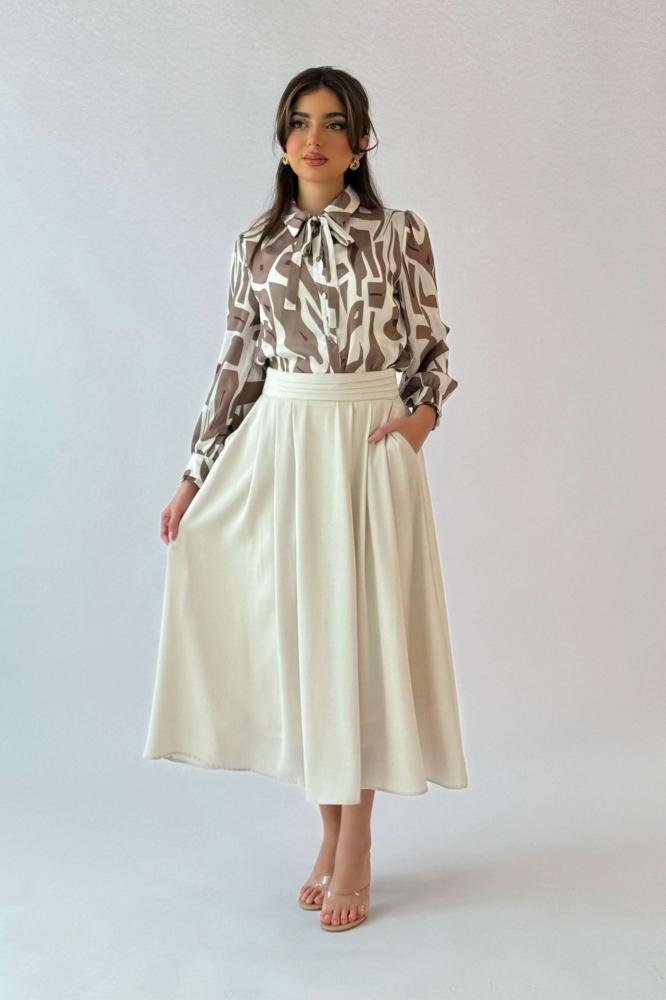 Beige midi flare skirt المقاس:(S - 36)